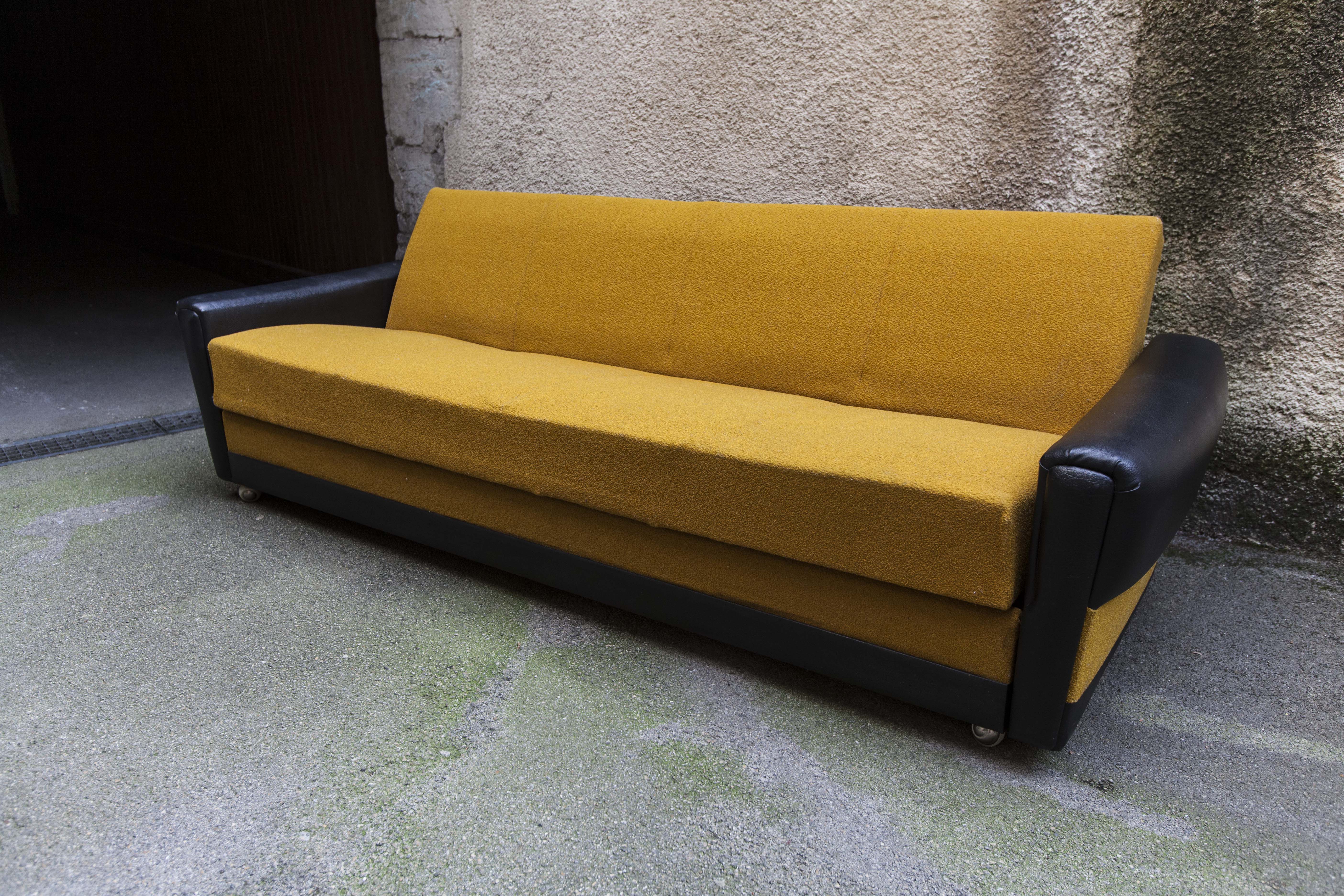 The 1970s gold and black Daybed couch