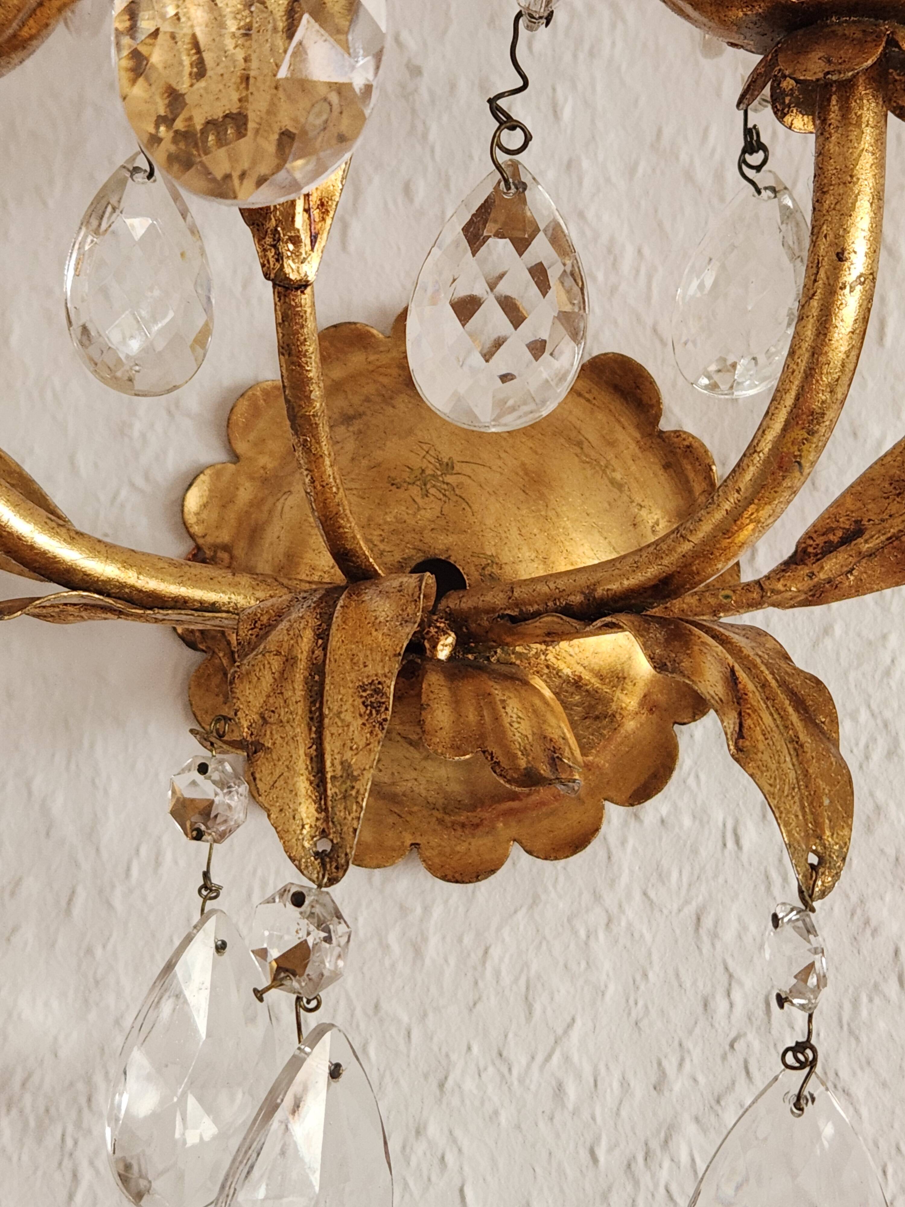 Hand-forged wall lamp gilded with gold leaf and crystals, Italy