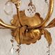Hand-forged wall lamp gilded with gold leaf and crystals, Italy