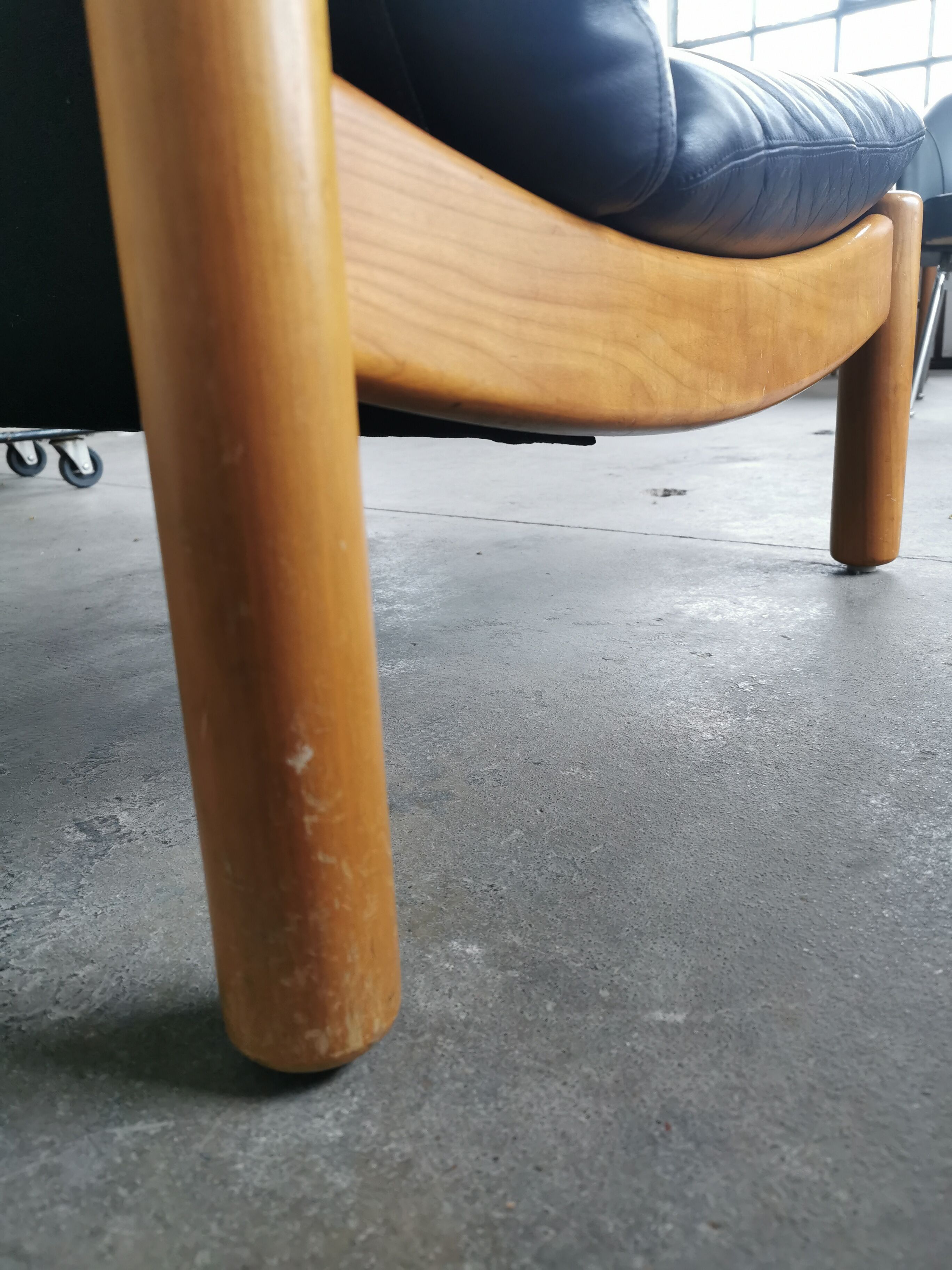 Pair of designer leather armchairs 80s
