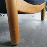 Pair of designer leather armchairs 80s