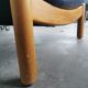 Pair of designer leather armchairs 80s