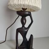 Ebony lamp with seated woman / 1930s