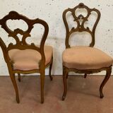 Pair of Louis XV style chairs in 20th century carved walnut