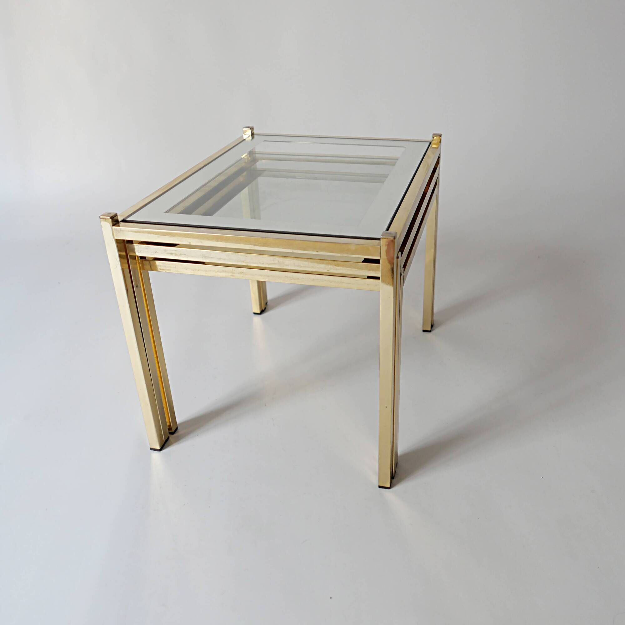 nesting tables in gold metal and mirror vintage 1970s design