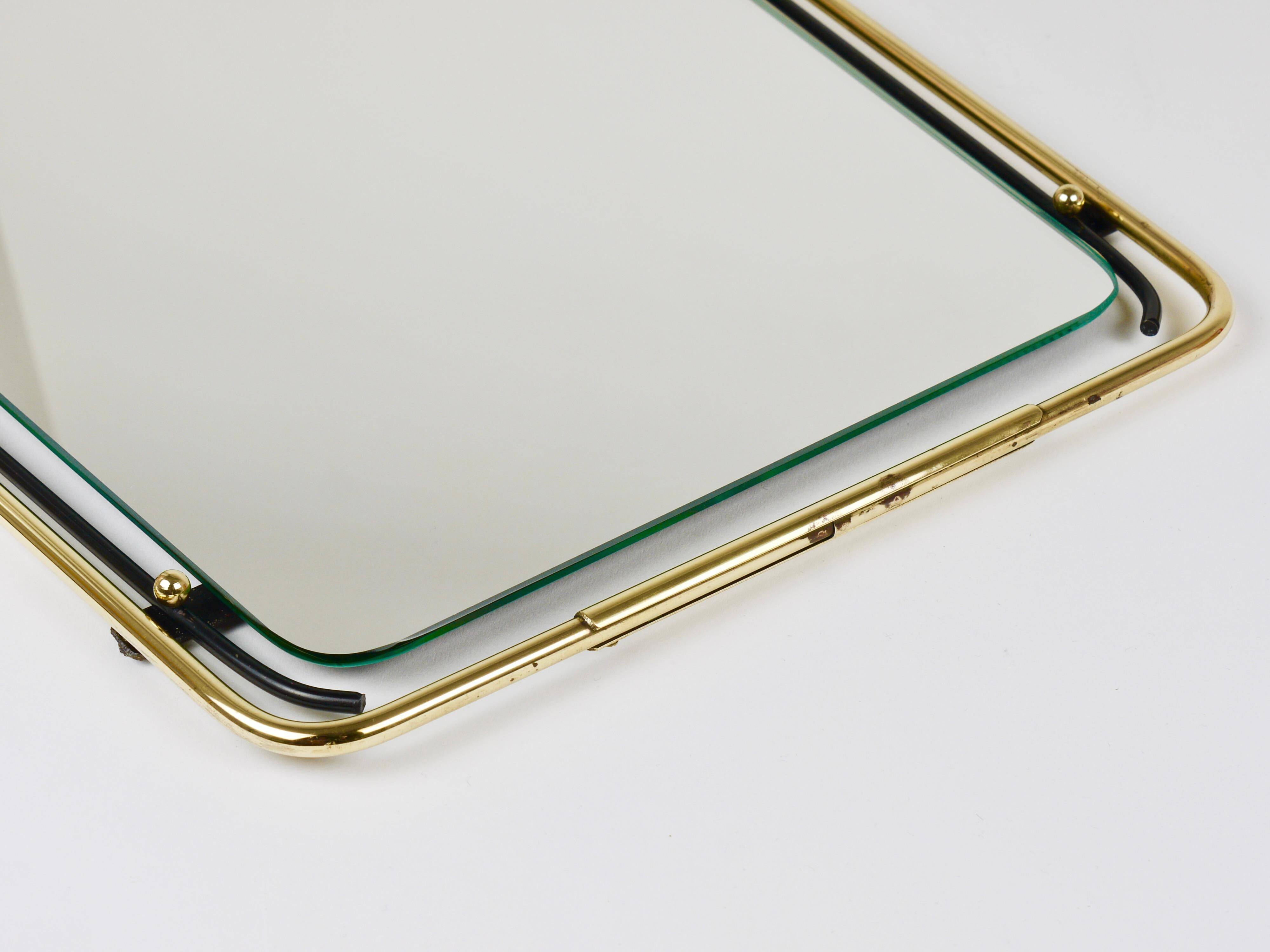 Wall mirror in brass wire with modernist loops from the mid-century, Italy, 1950s.