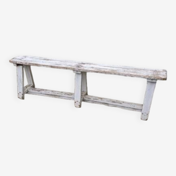 Old bench limed in white