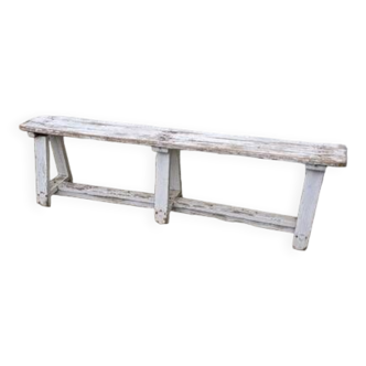 Old bench limed in white