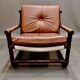 Fauteuil et son ottoman rotin et cuir 1950