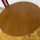 Round table with central base from the 1960s by Baumann.