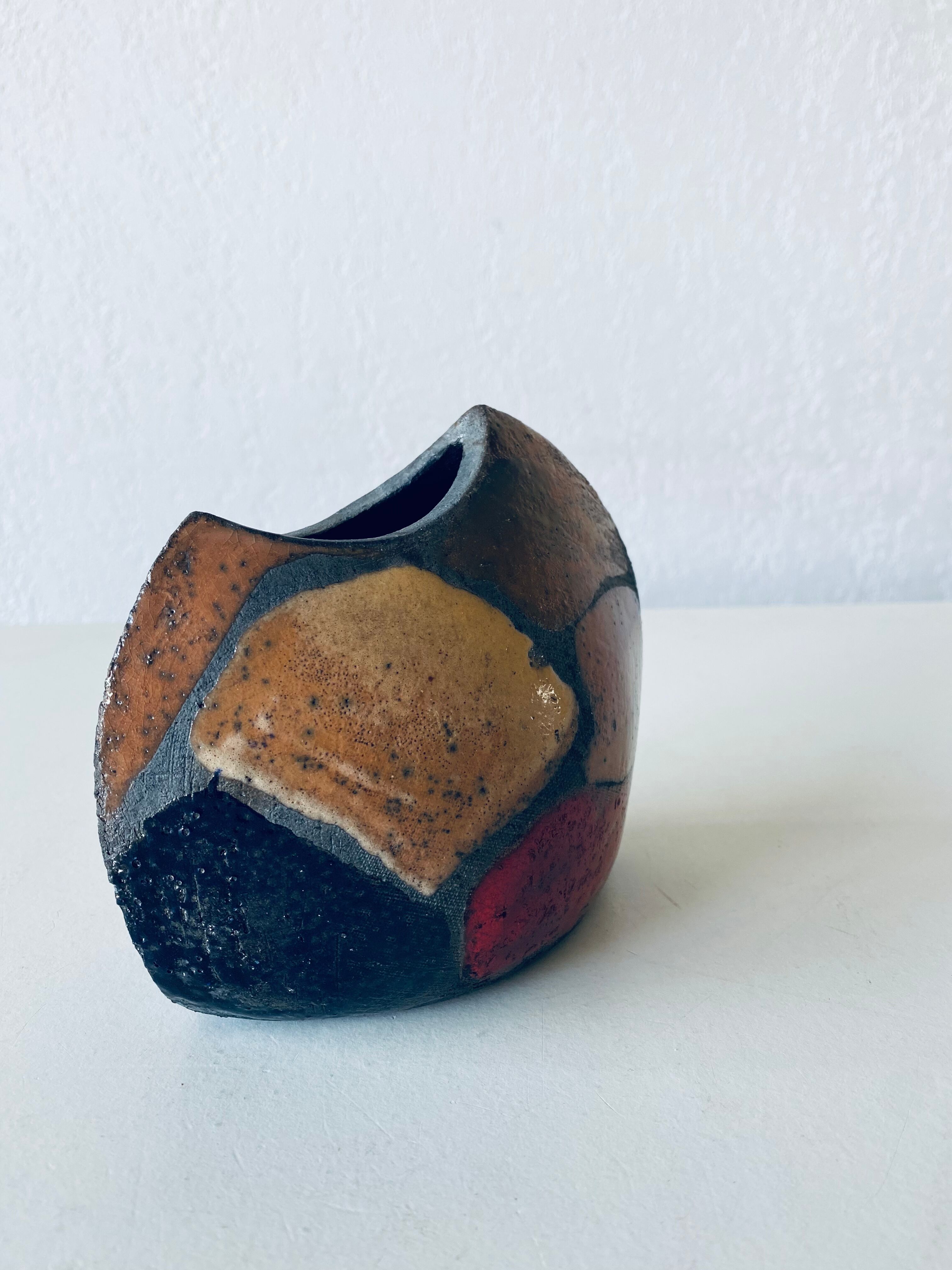 Enamelled ceramic lens vase