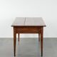 Elegant and subtle antique French dining table made of fruitwood