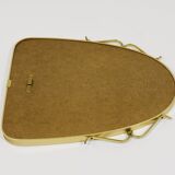 Elegant wall mirror in brass and black from the mid-century, Italy, 1950s.