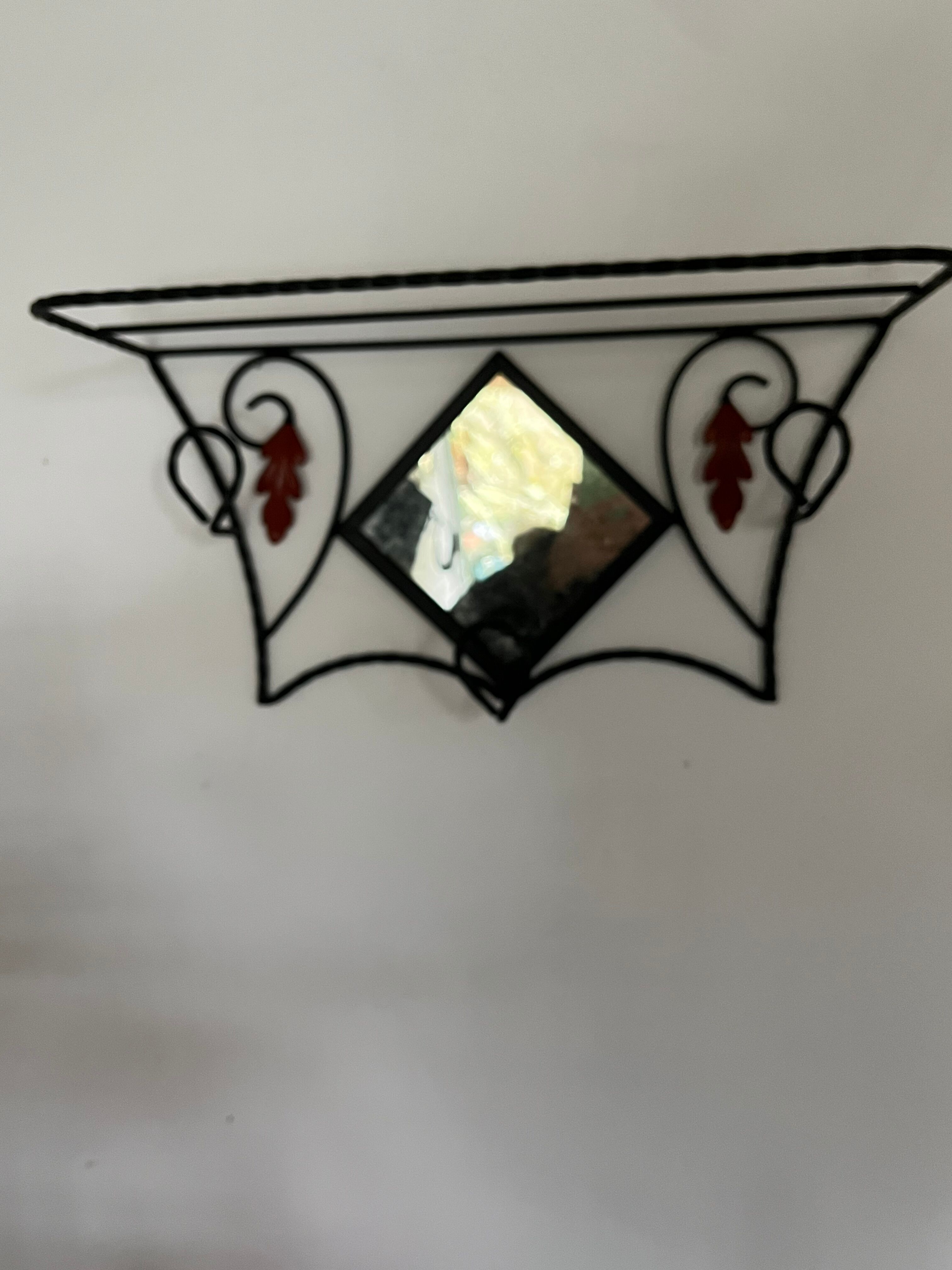 Wrought iron coat rack