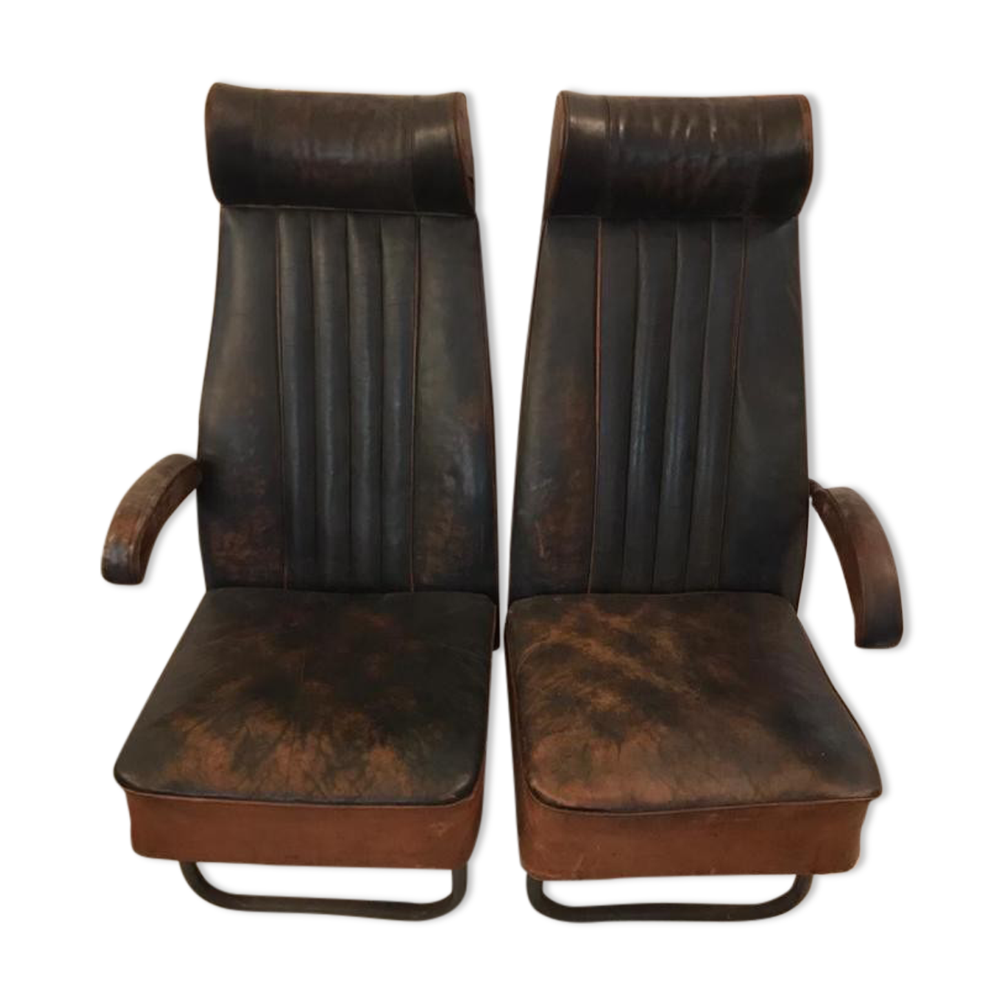 Vintage 1950s leather double-plane bus armchairs