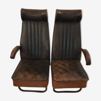Vintage 1950s leather double-plane bus armchairs
