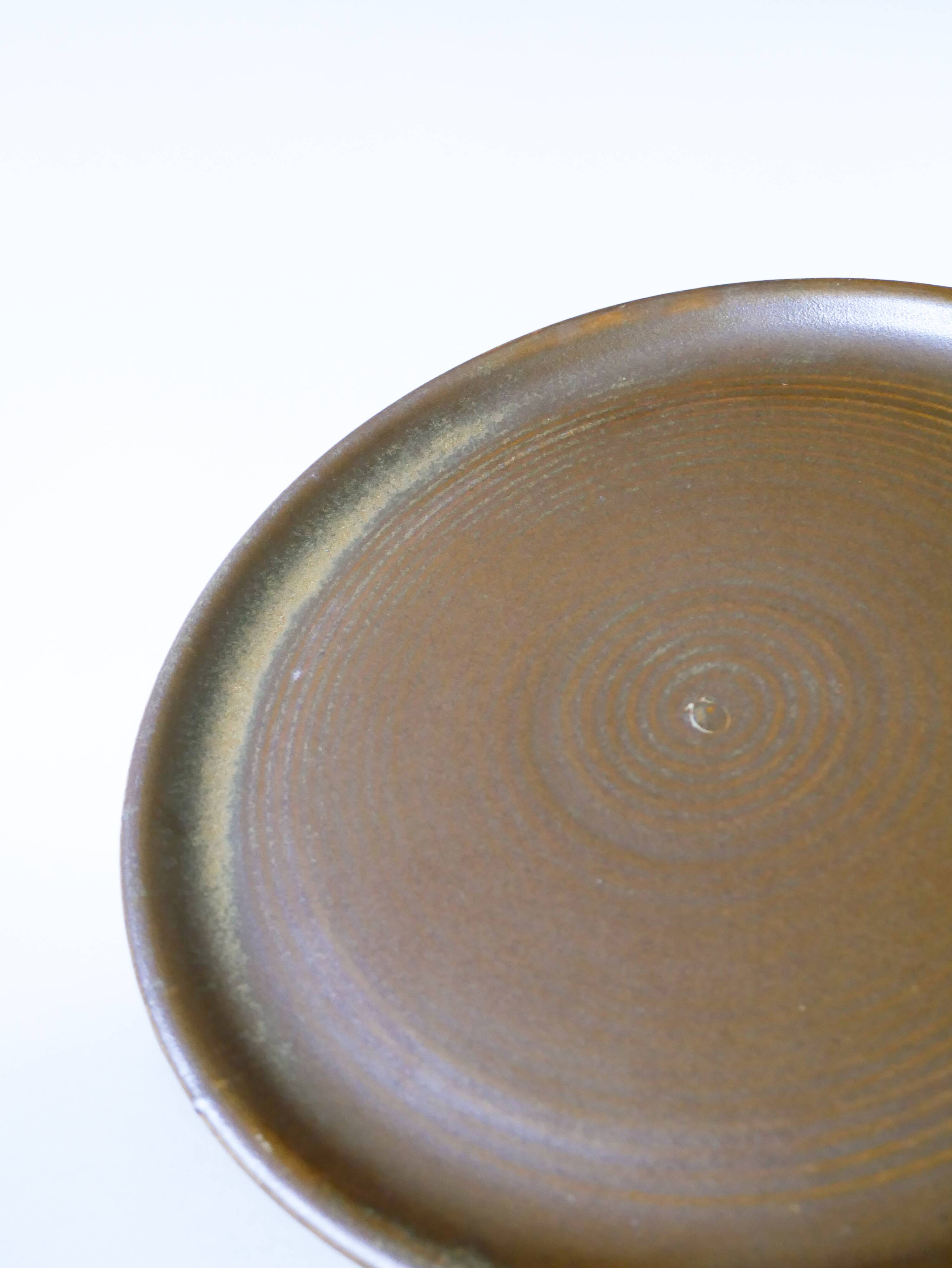 Set of 5 large flat plates in stoneware, 1970.
