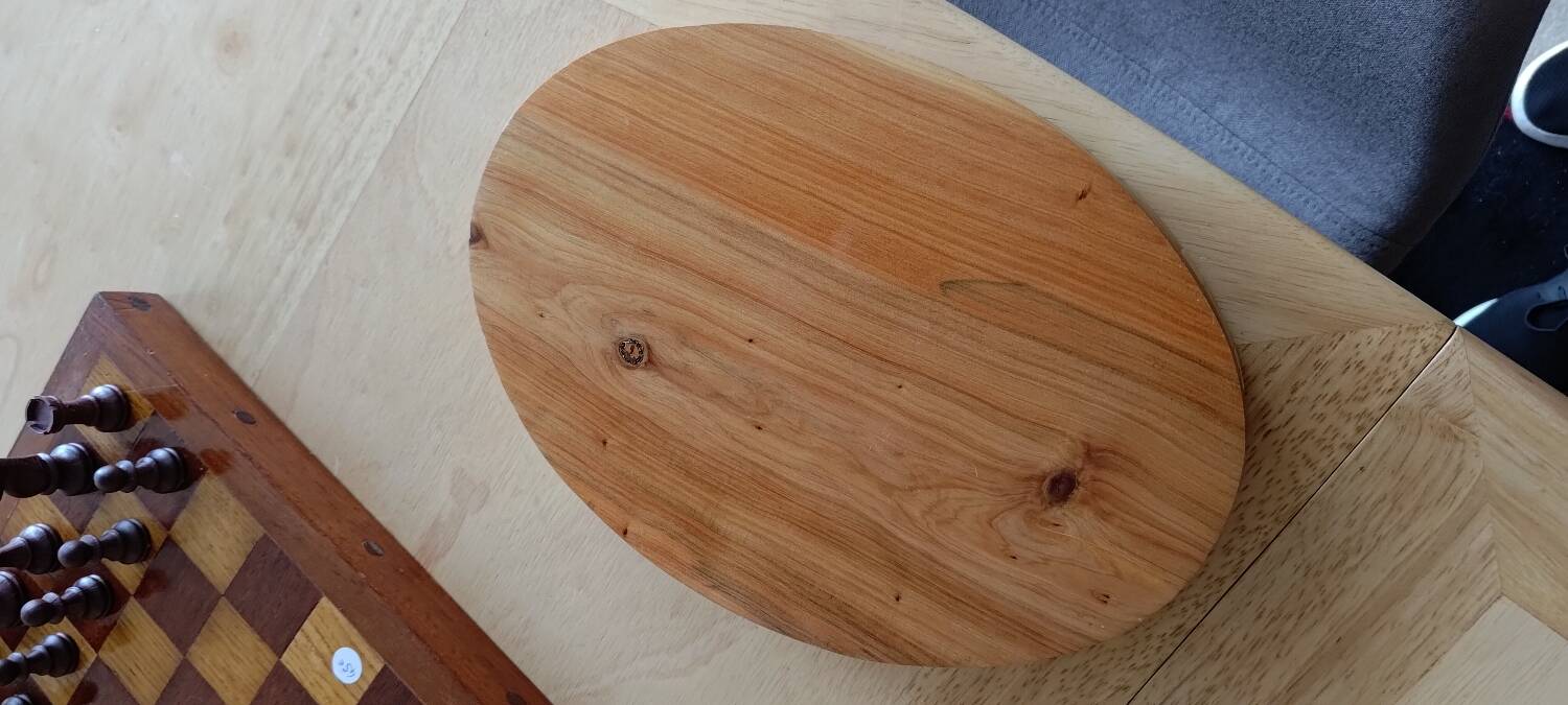 Inlaid wood top.