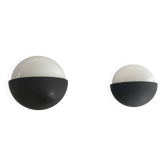 Round black metal wall lights, small and large set, by Bega, 1970s, Germany.