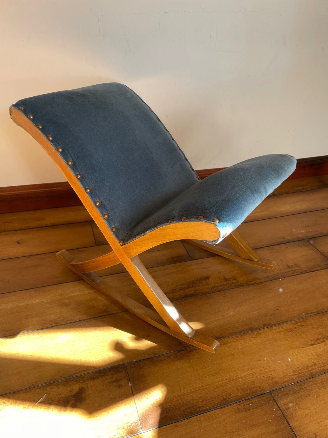 Rocking blue velvet footrest