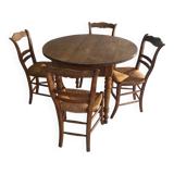 Round wooden table (4/6 people) with 4 straw chairs