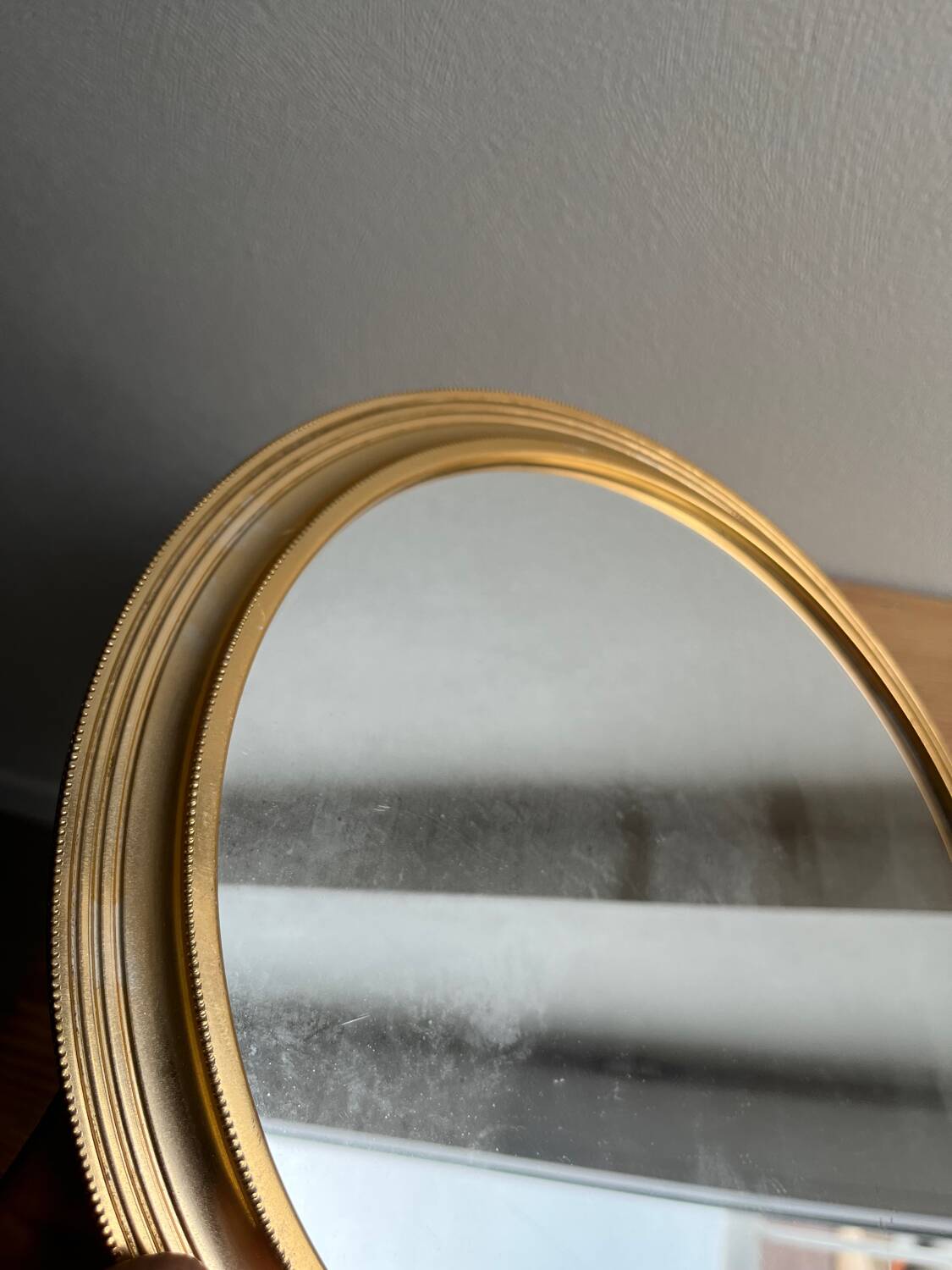 Vintage gold round mirror