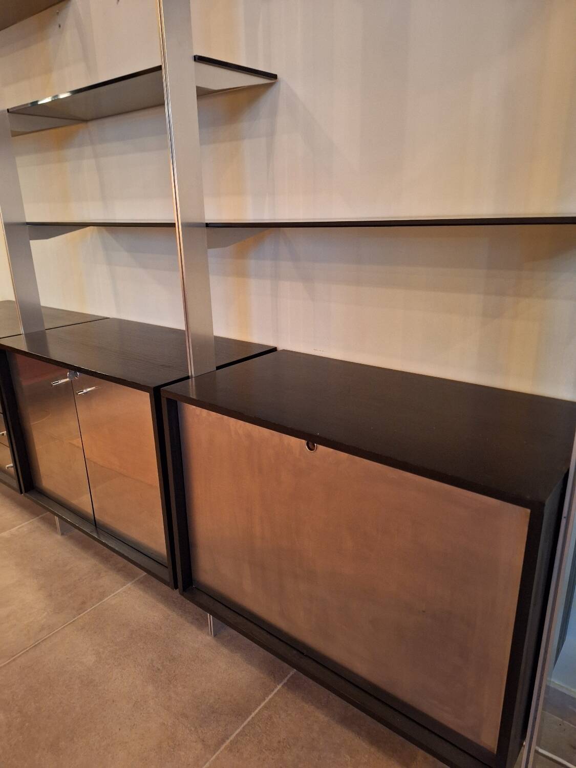 Wall shelves in wood, stainless steel and glass Roche Bobois
