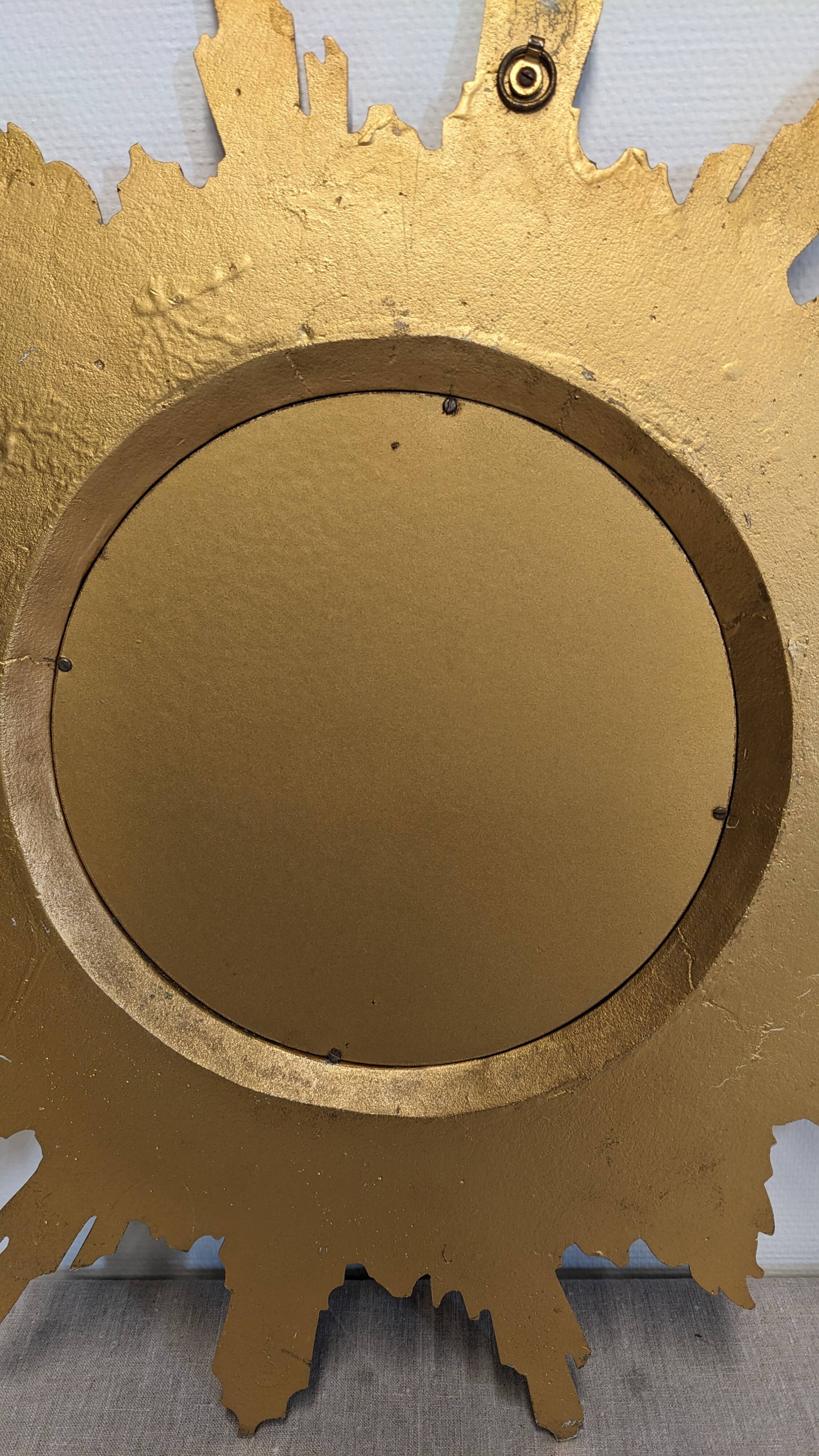 XL witch's eye sun mirror in gilded metal, Italy circa 1970