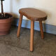 Pair of small wooden tripod stools