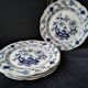 4 Royal Boch dessert plates with "Blue Onions" pattern.