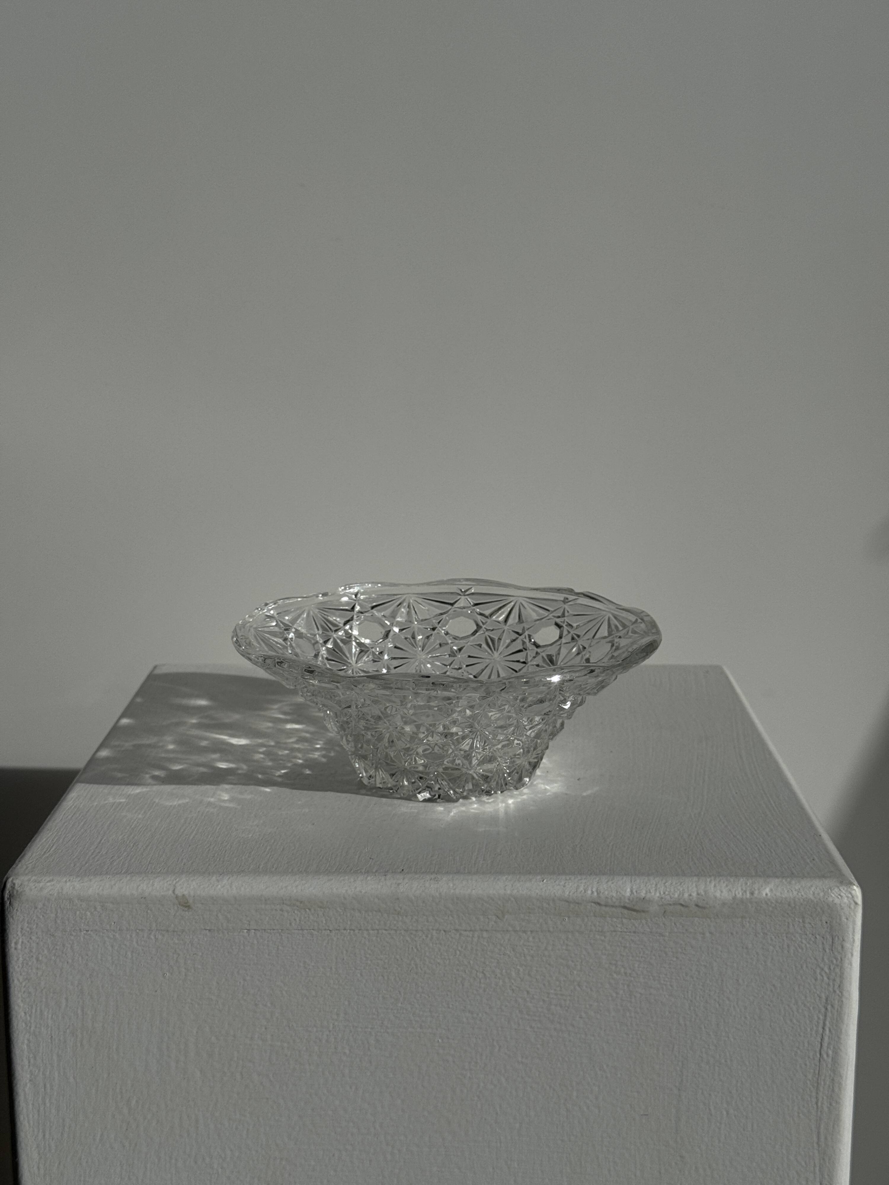 Small glass dish with vintage diamond points, a sparkle.