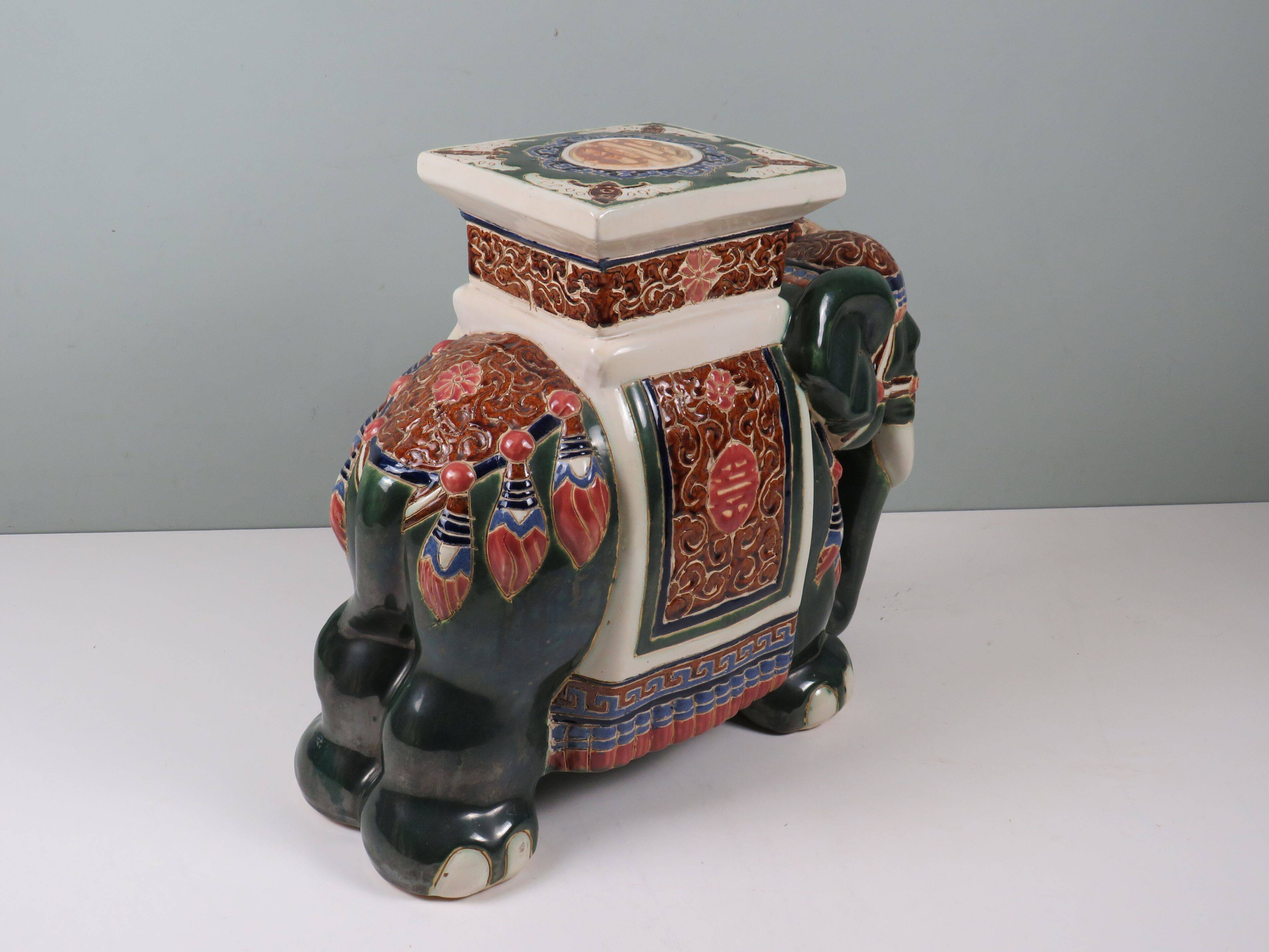 Large vintage ceramic elephant in glazed finish, stool or side table.