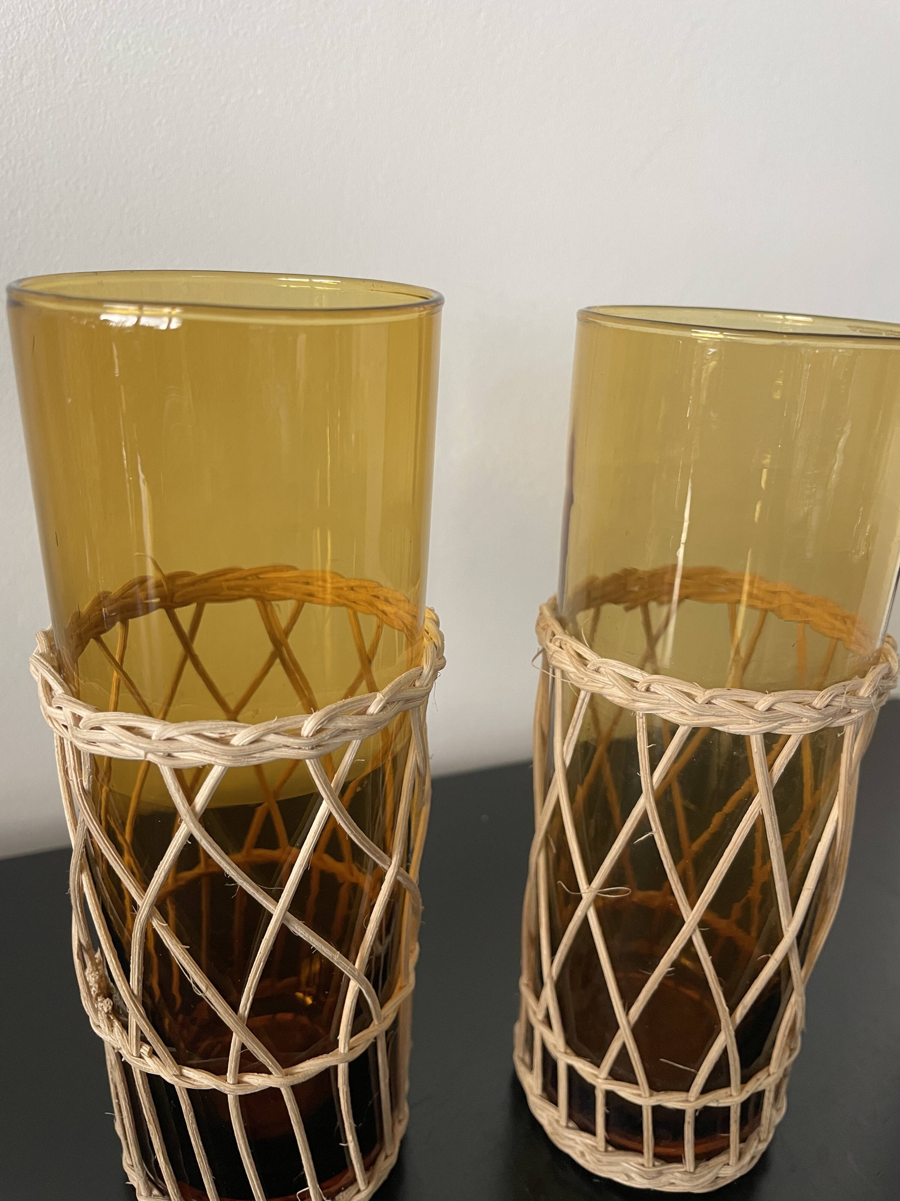 Set of 2 smoked orangeade glasses in woven wicker