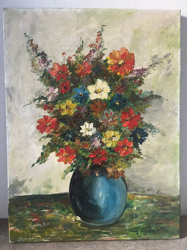 Bouquet de fleurs dans un vase bleu, signé