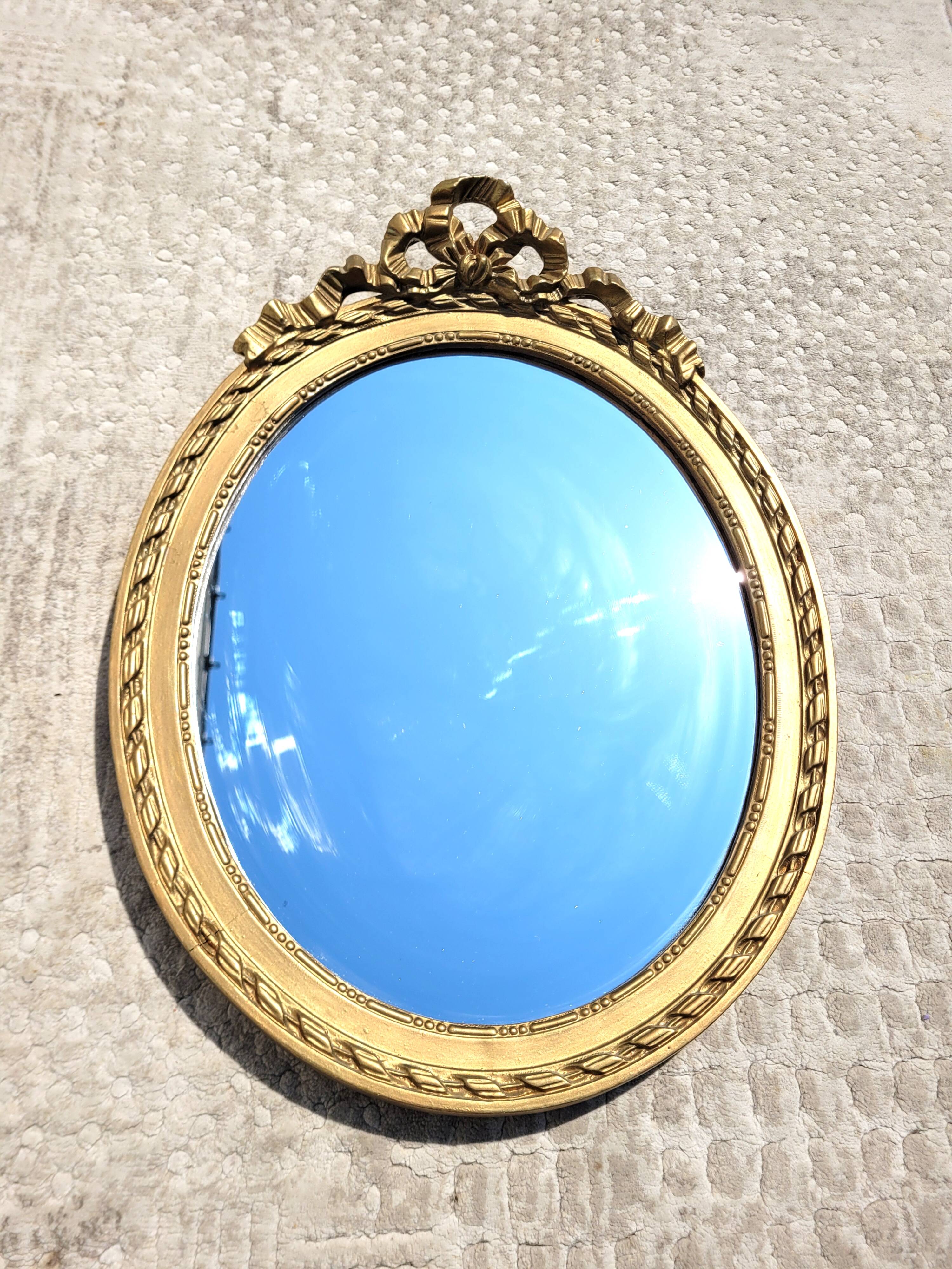 Large oval Louis XVI style mirror 47x65cm