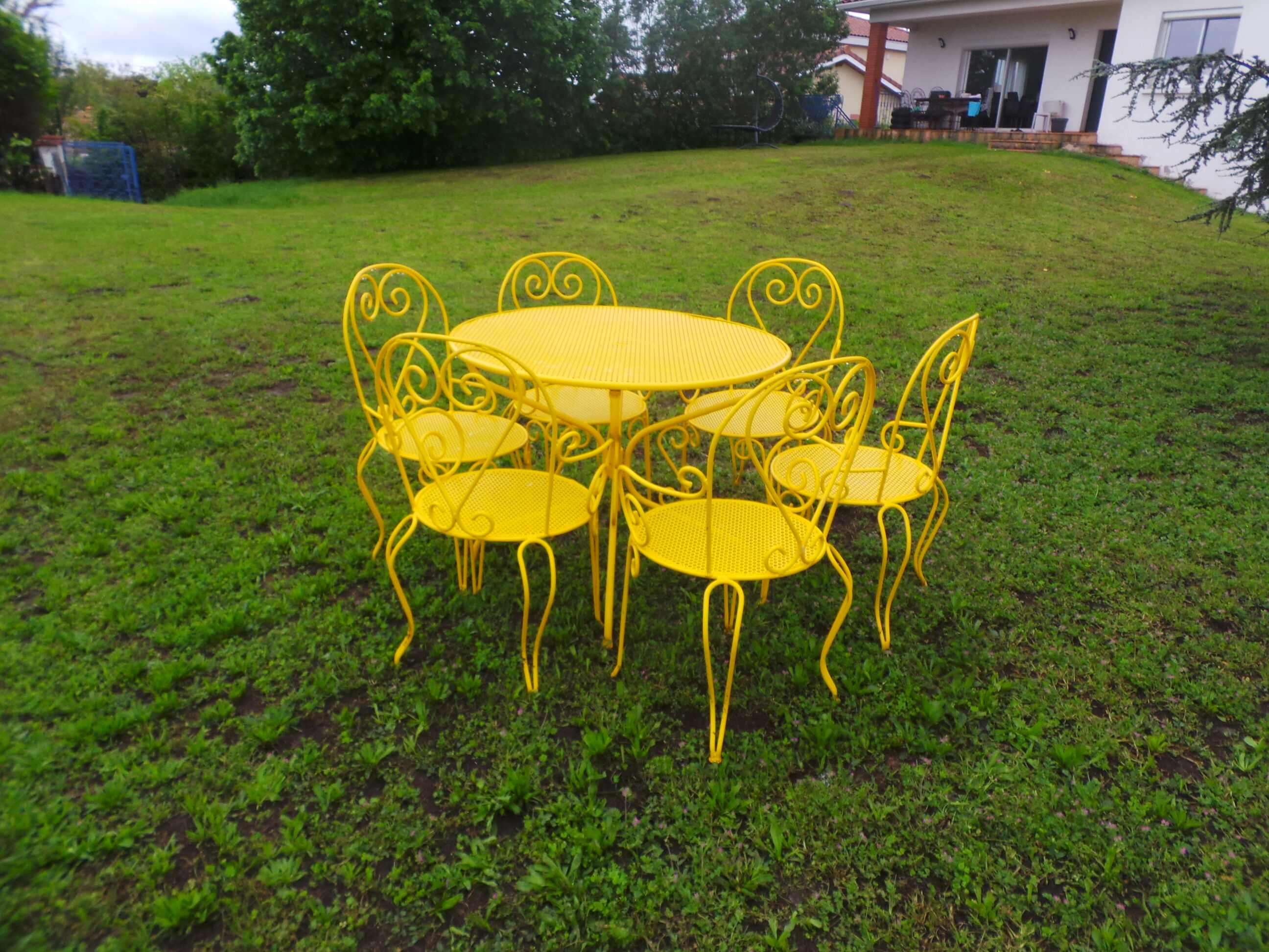 Yellow wrought iron garden room