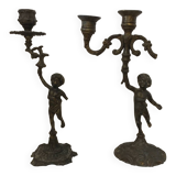 Pair of Cherub candlesticks.