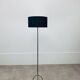 1950s tripod floor lamp, brass and black metal