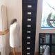 Metal column ten valves storage cabinet administration. Black mast and wood color