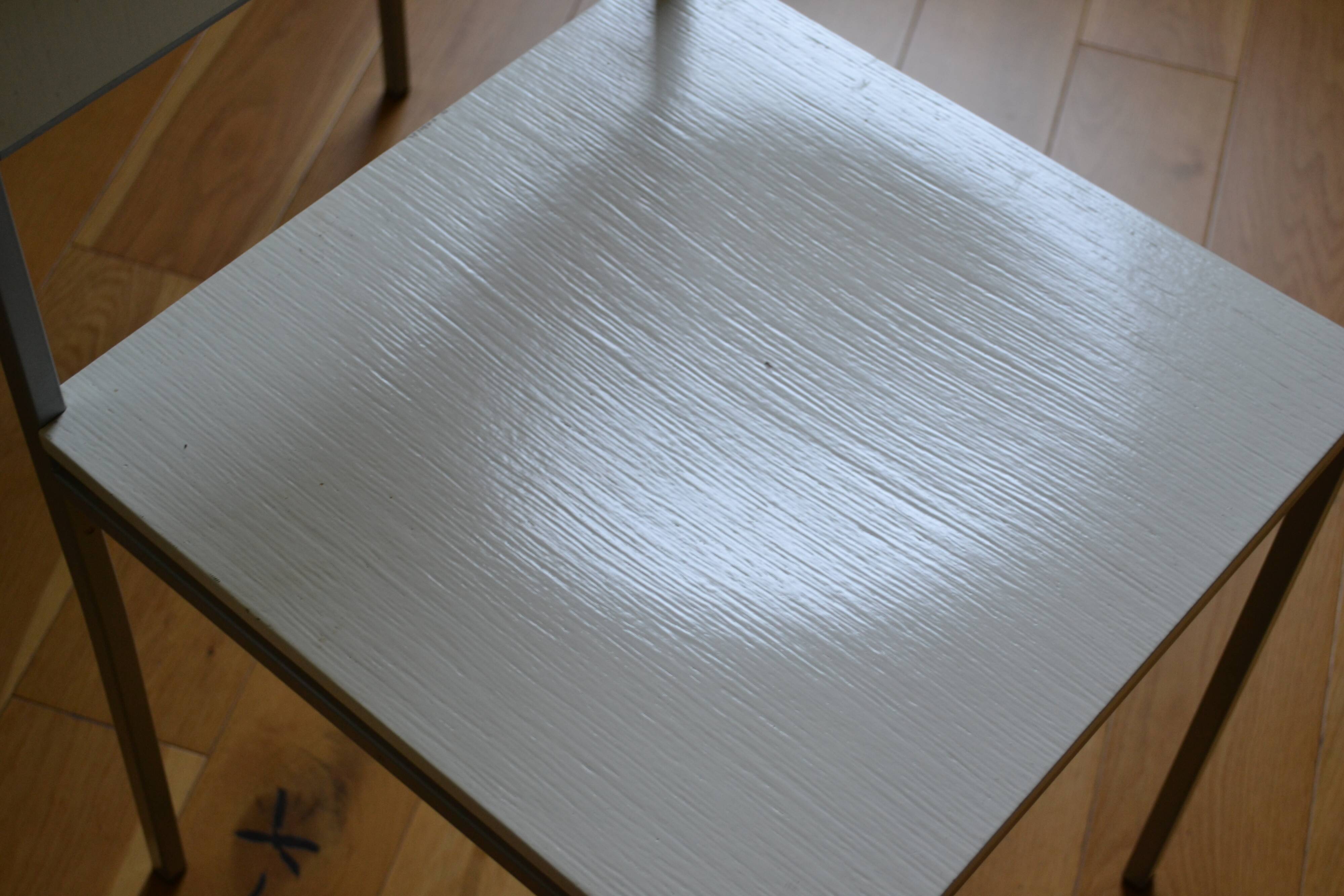 Set of 4 vintage metal and wood chairs from the 1990s.