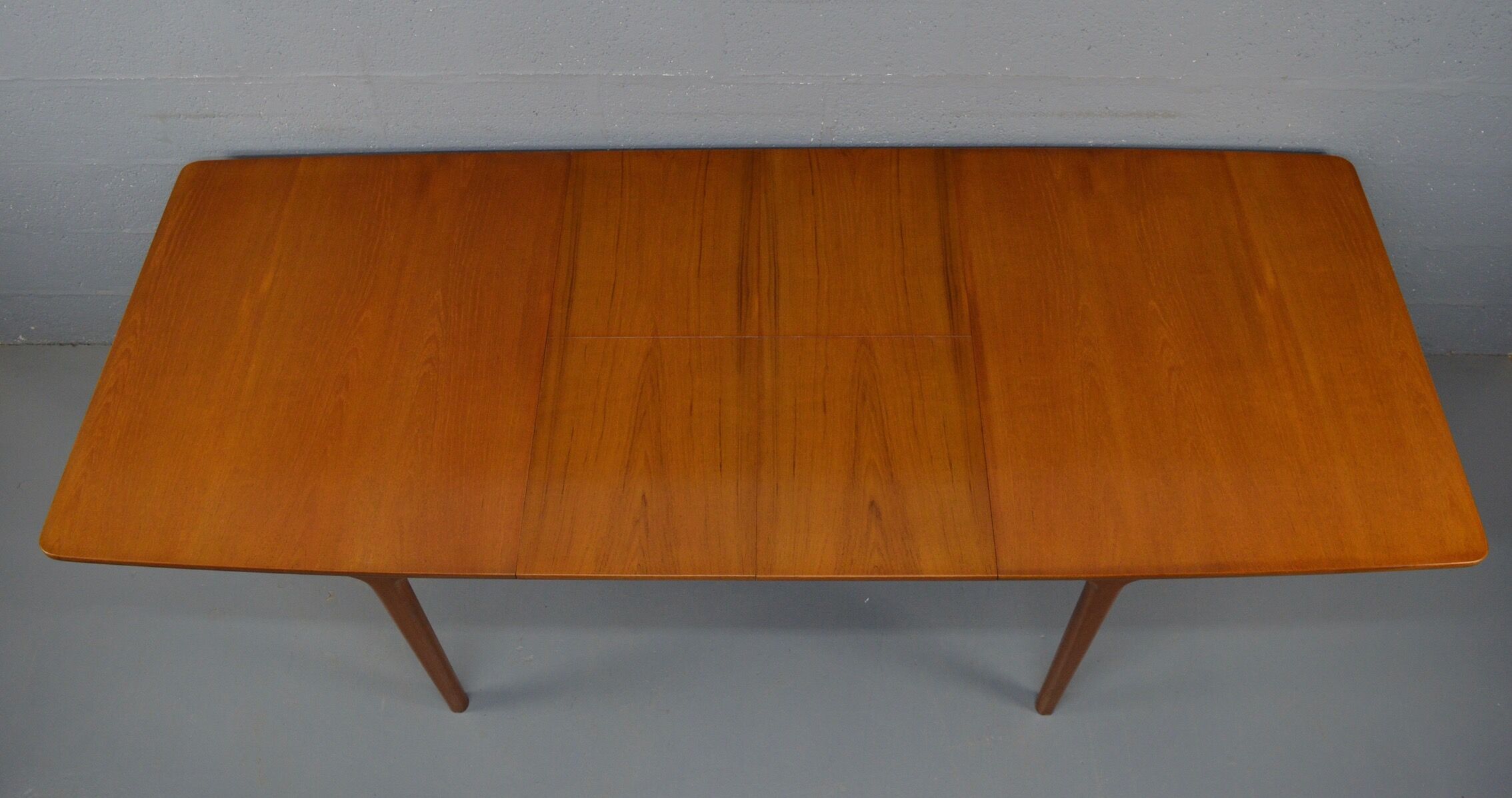 Extendable table by A.H. McIntosh