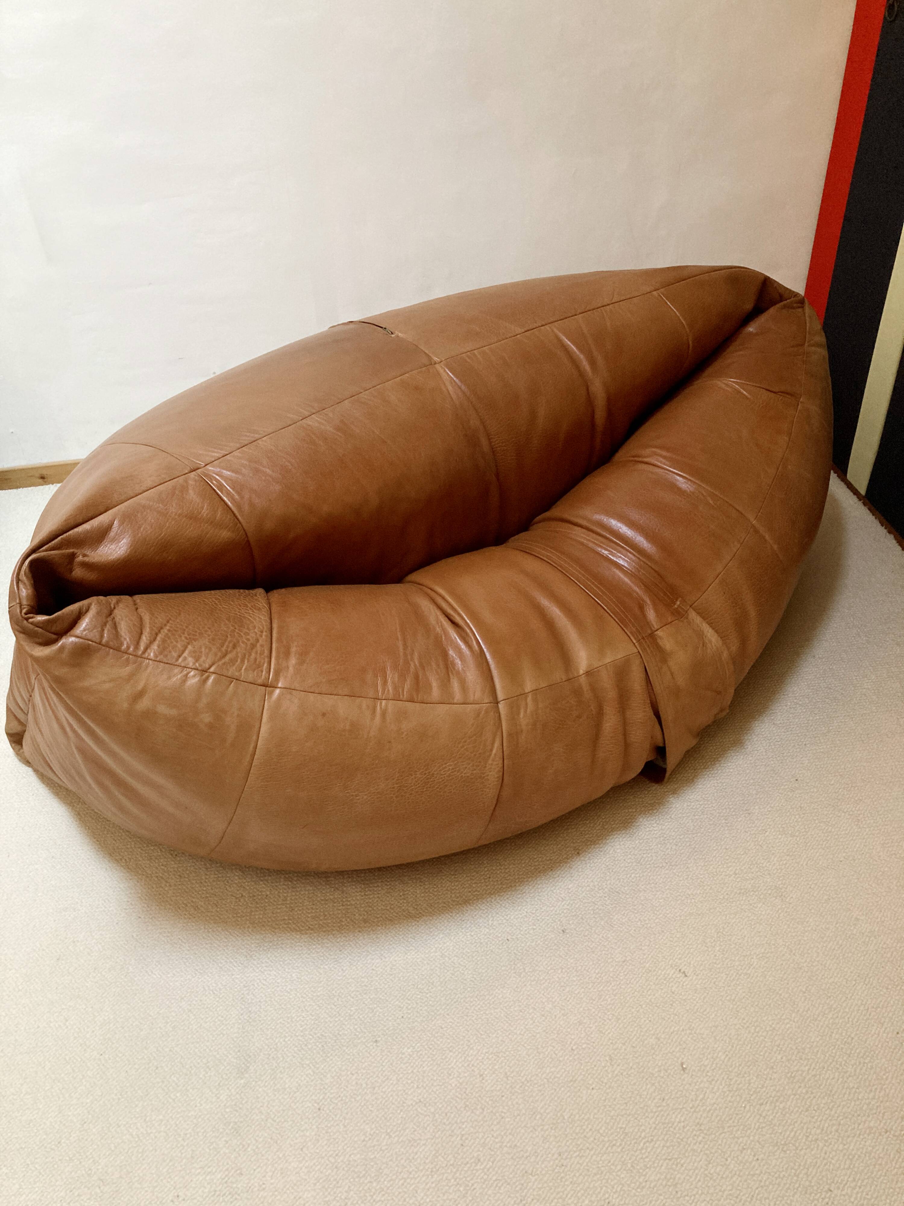 Two-seater leather pouf sofa by Raphaël Raffel for Honoré Paris
