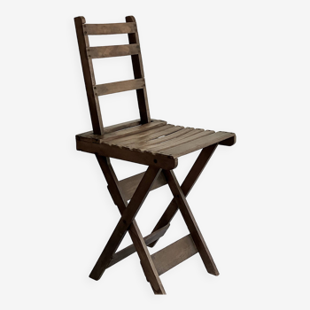 Old folding chair with backrest