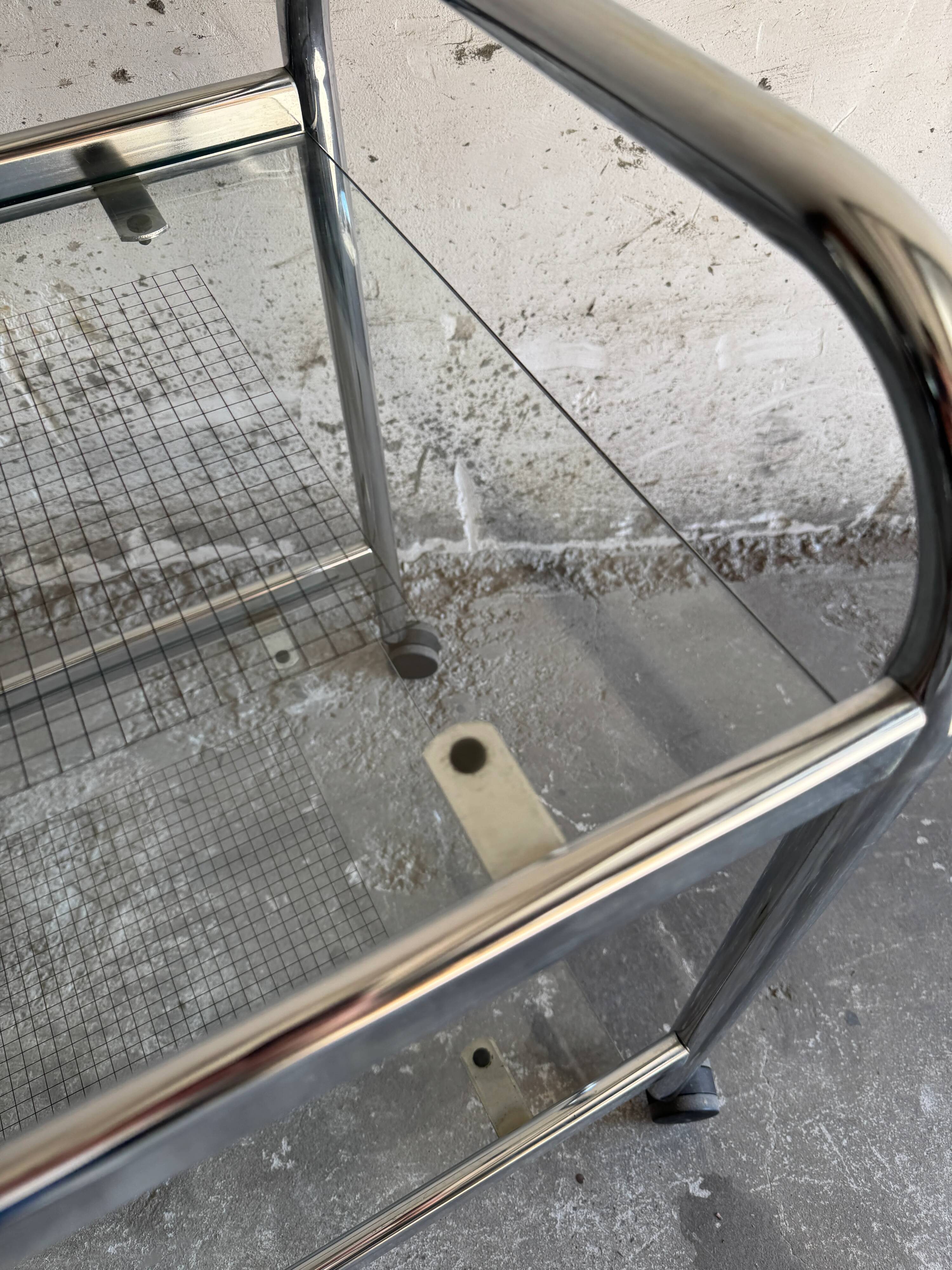 Vintage silver chrome-plated steel and glass two-tier serving trolley with wheels