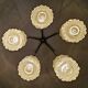 Mid Century Modern spider chandelier in teak, rosewood, and crystal.