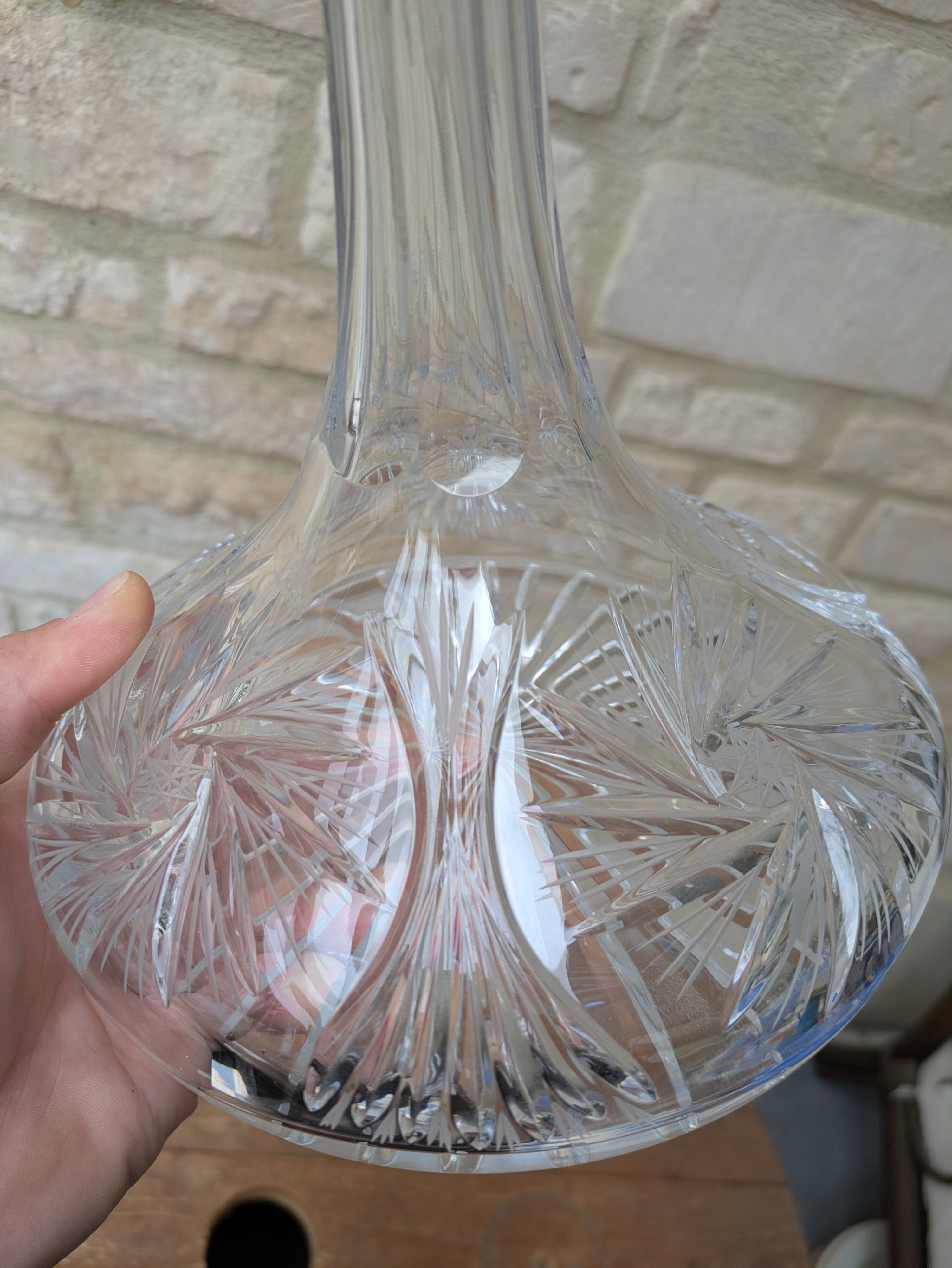 Antique cut crystal decanter with stopper.
