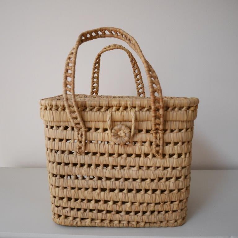 Basket made of woven palm leaves