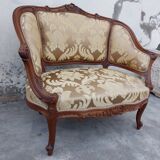 Louis XV shepherdess armchair in carved walnut