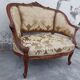 Fauteuil bergère louis XV en Noyer sculpté