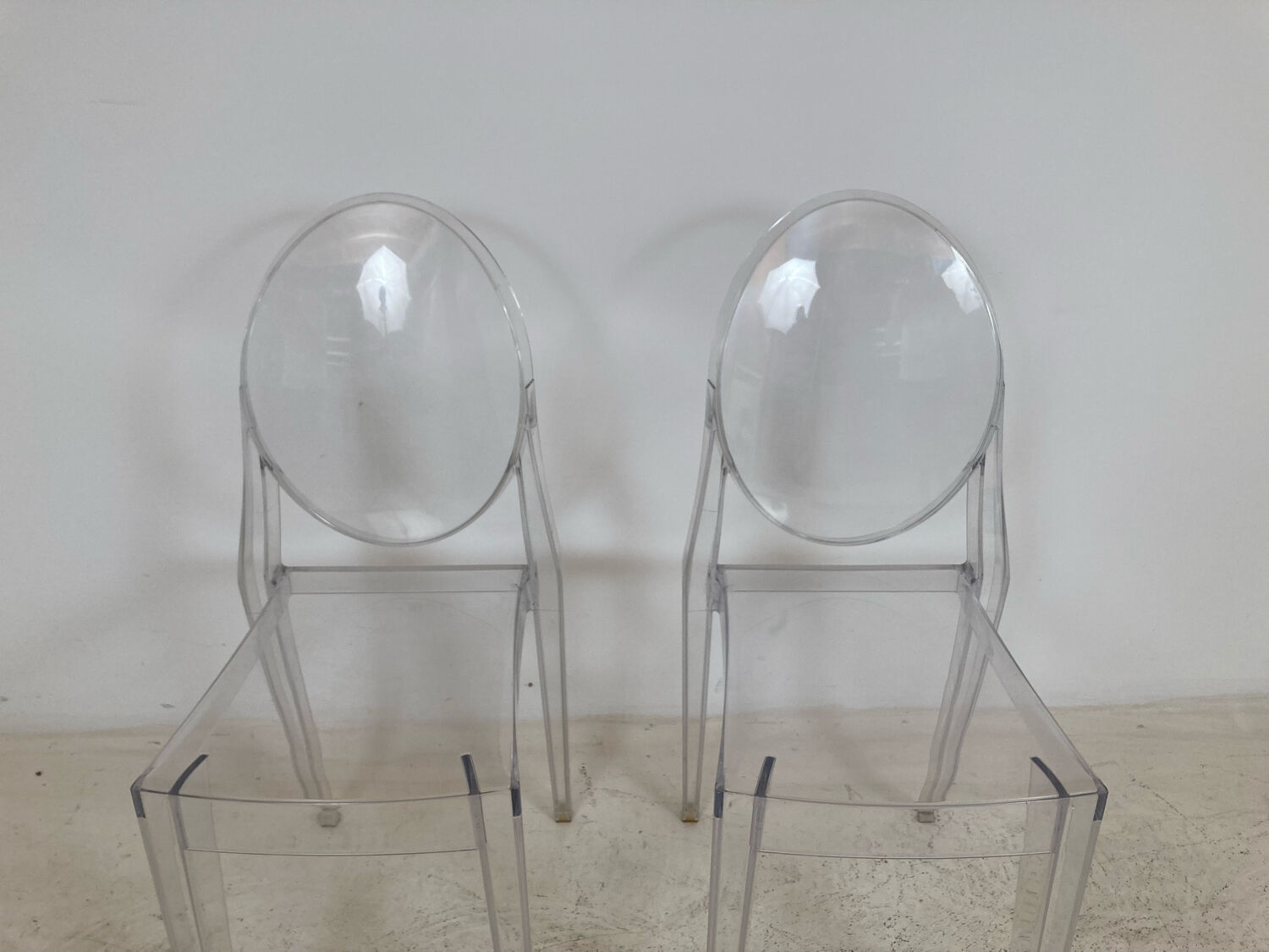 Pair of Victoria Ghost chairs by Philippe Starck Kartell edition